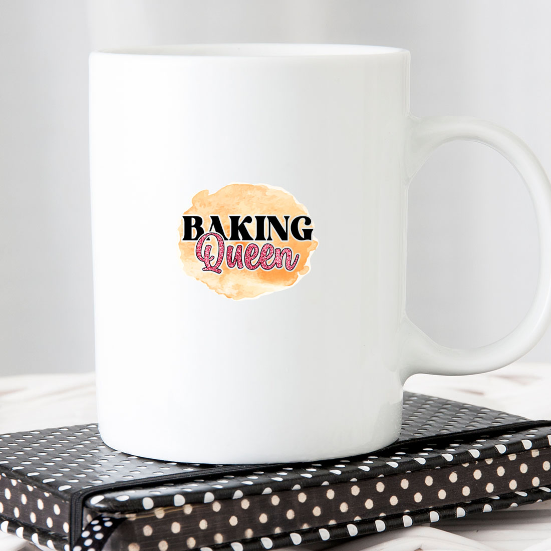 White coffee mug with the words baking queen on it.