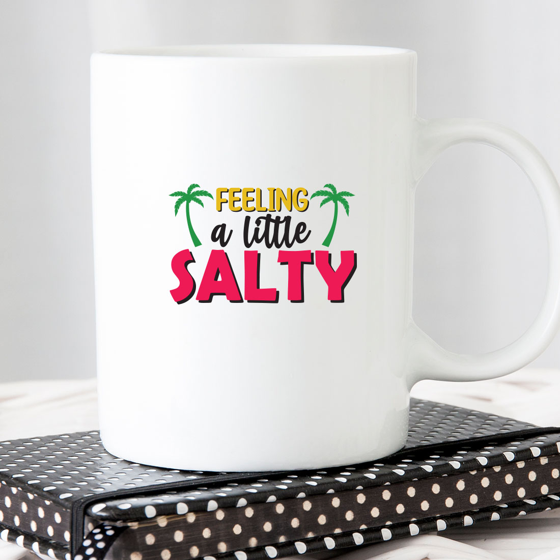 White coffee mug with the words feeling a little salty on it.