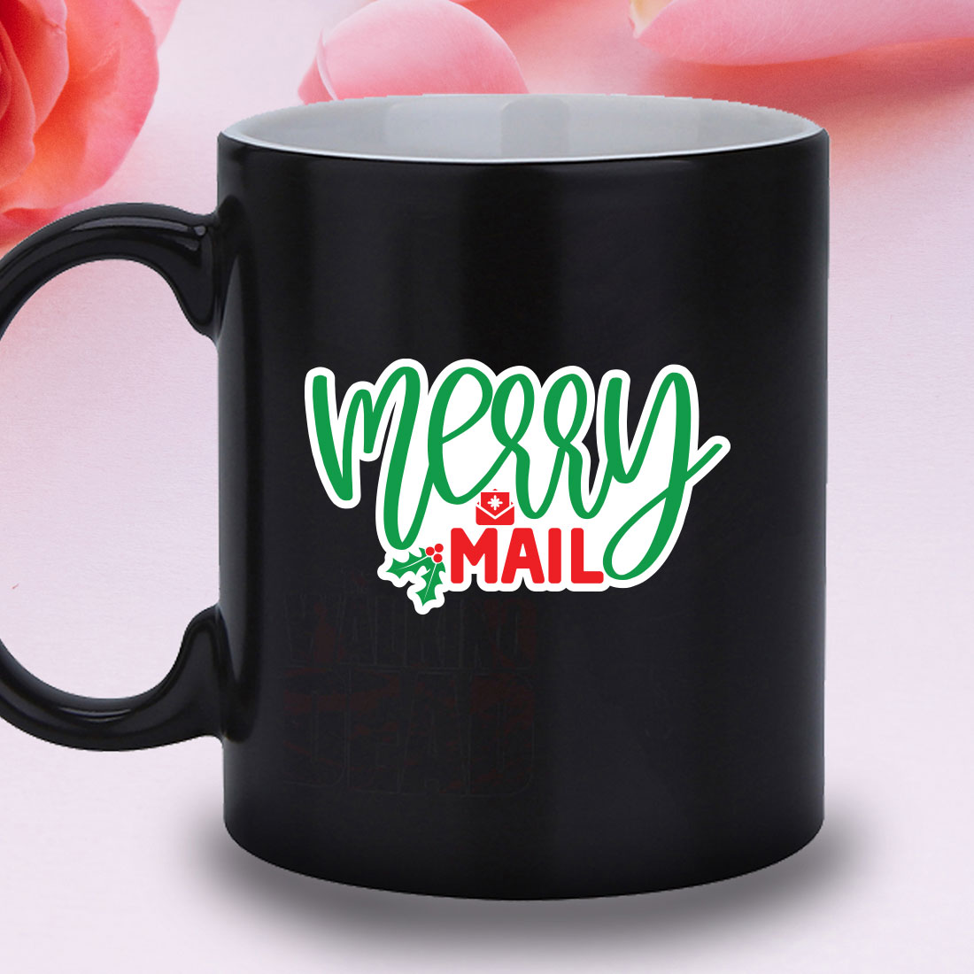 Black coffee mug with merry and mail on it.
