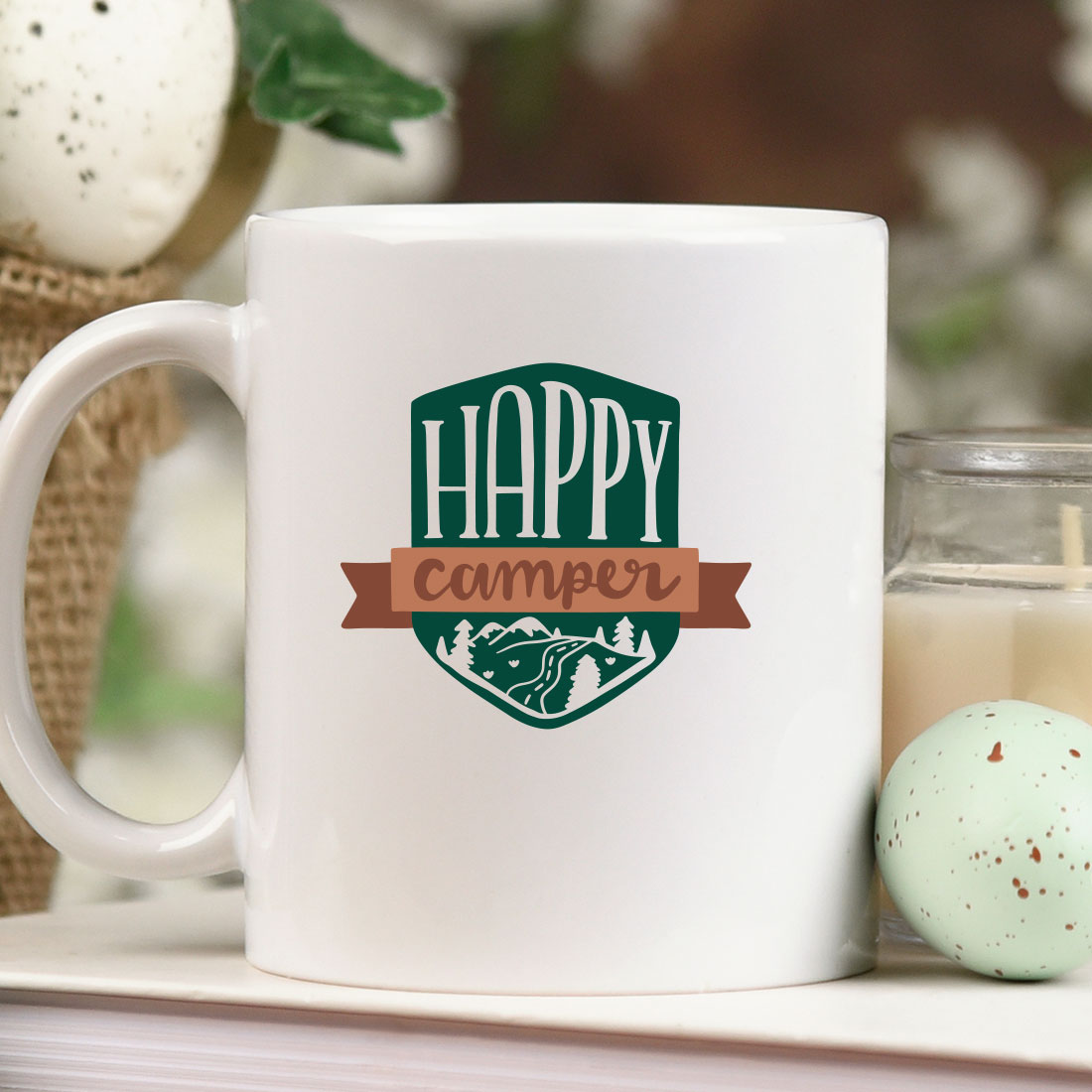 White coffee mug sitting on top of a table.