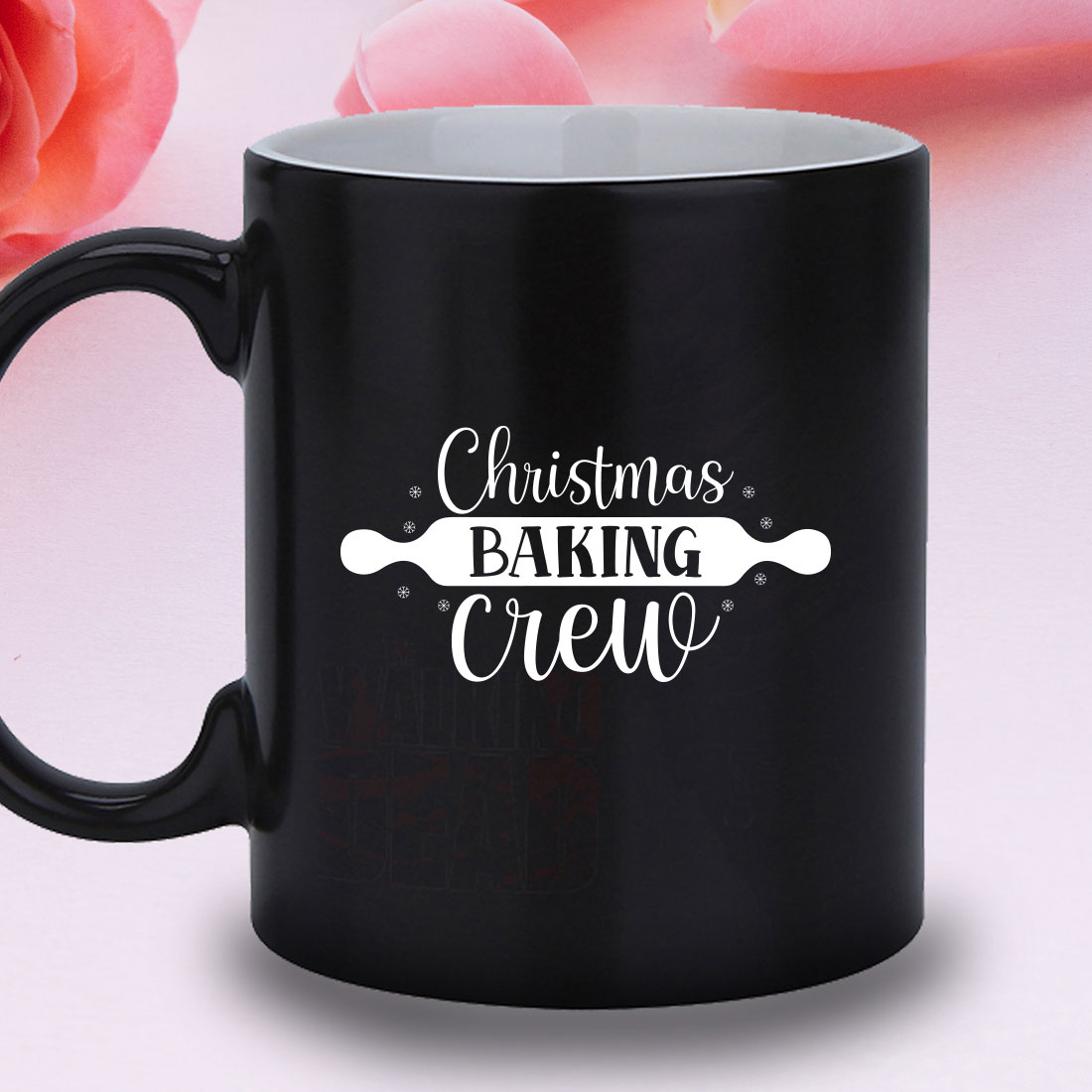 Black coffee mug with the words christmas baking crew on it.