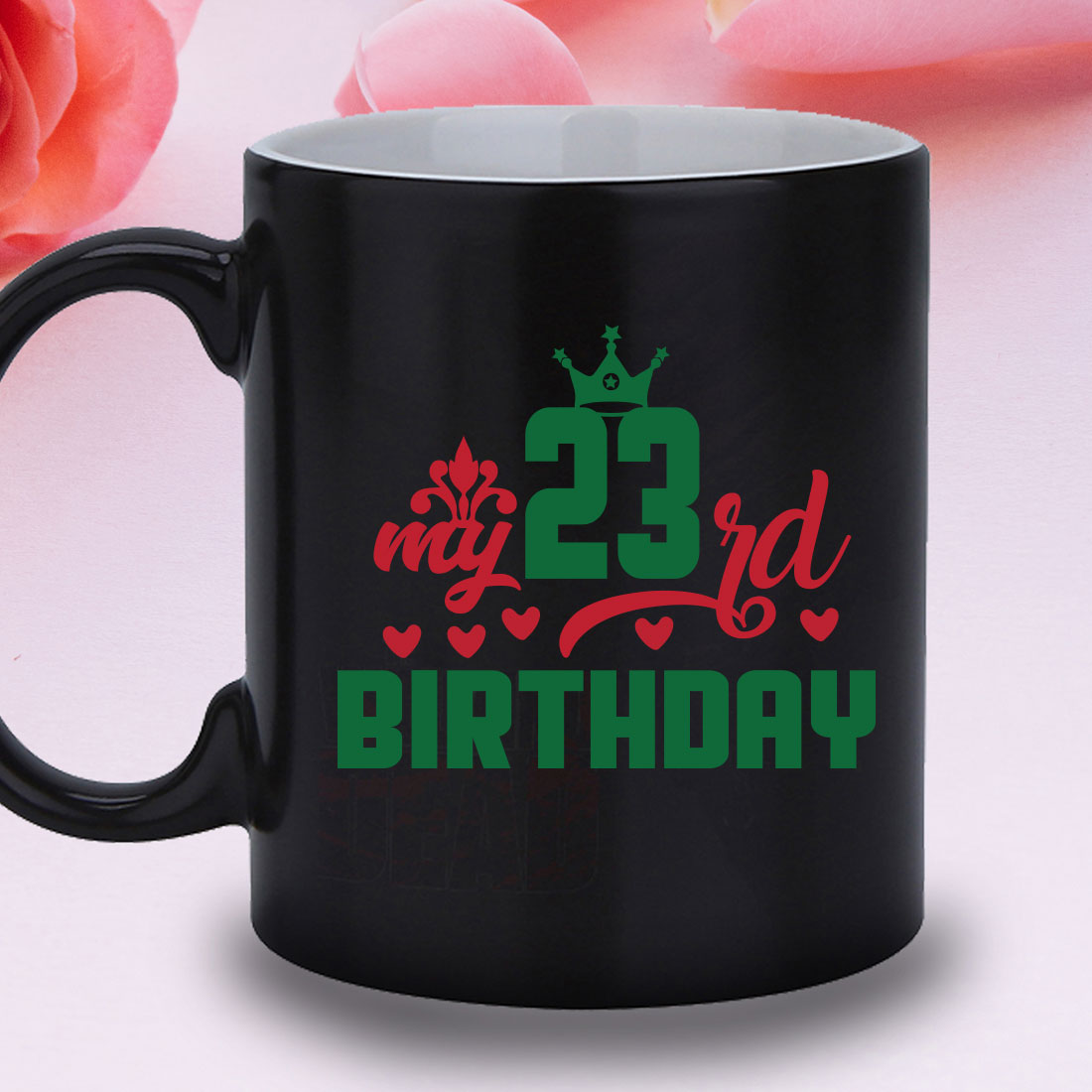 Black coffee mug with the number twenty and a crown on it.