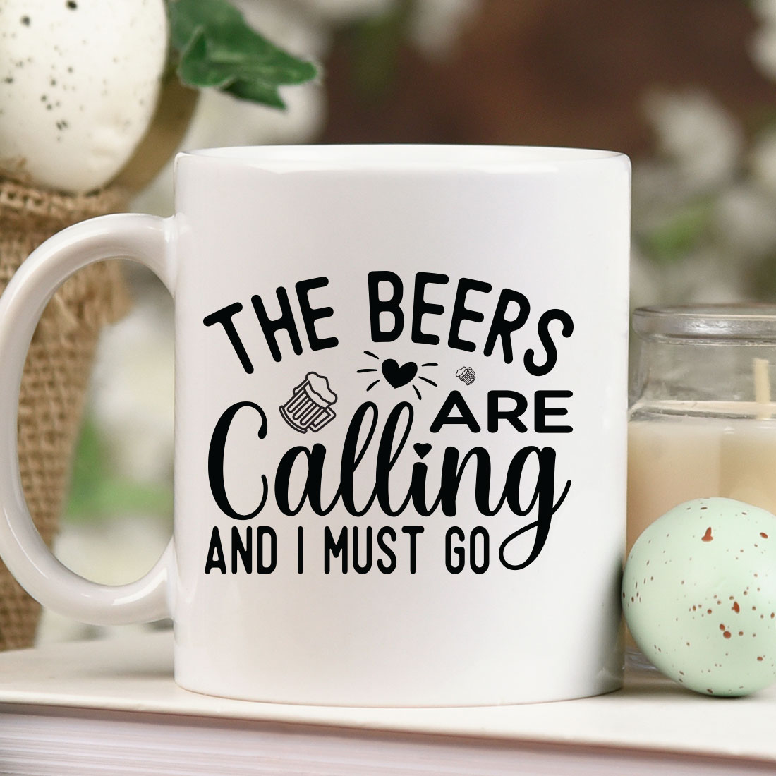 White coffee mug with the words the beers are calling and i must go.