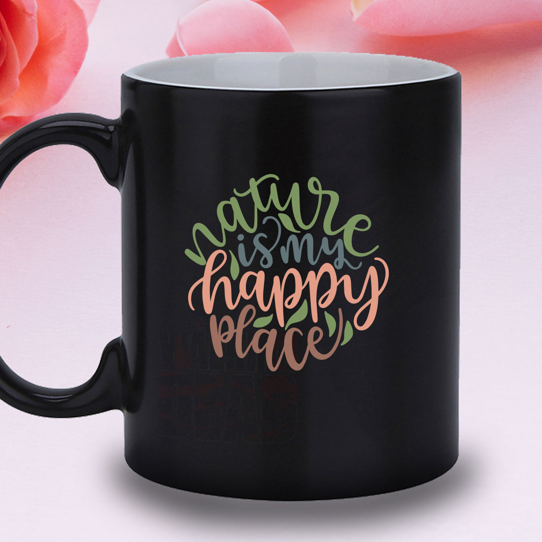 Black coffee mug with the words happy place on it.