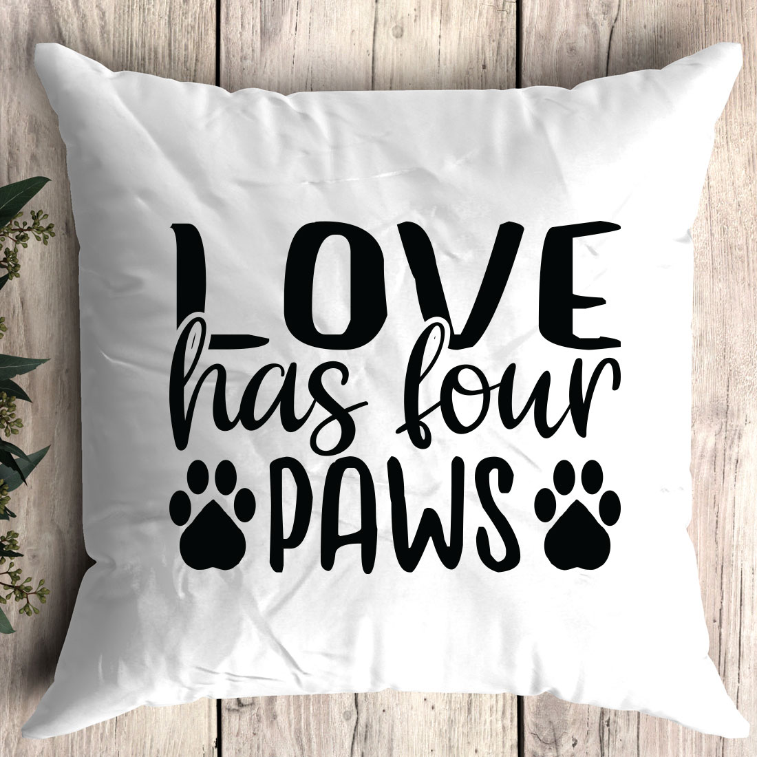 Pillow that says love has four paws.