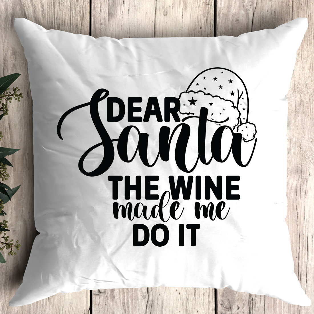 Pillow that says dear santa the wine made me do it.