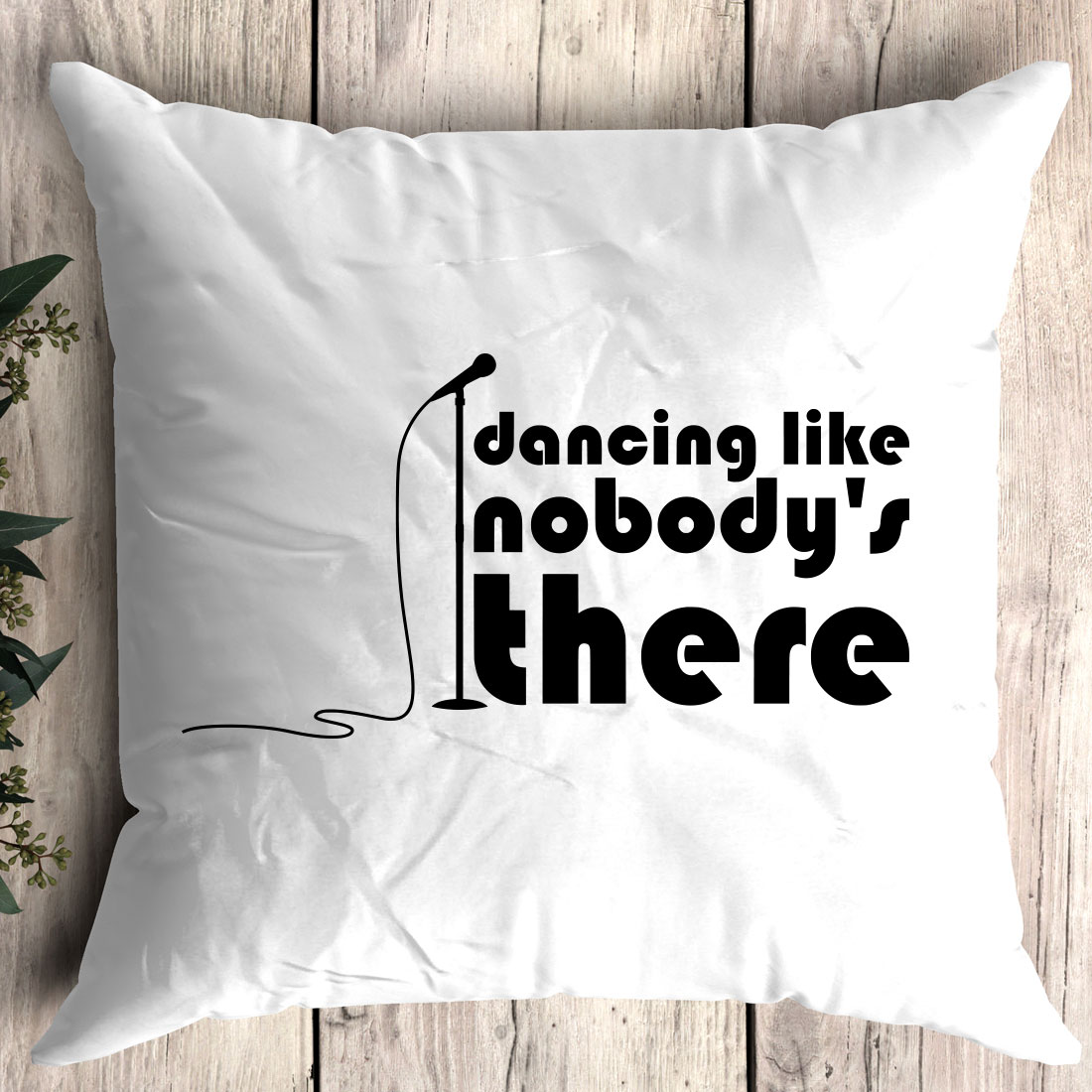 Pillow that says dancing like nobody's there.
