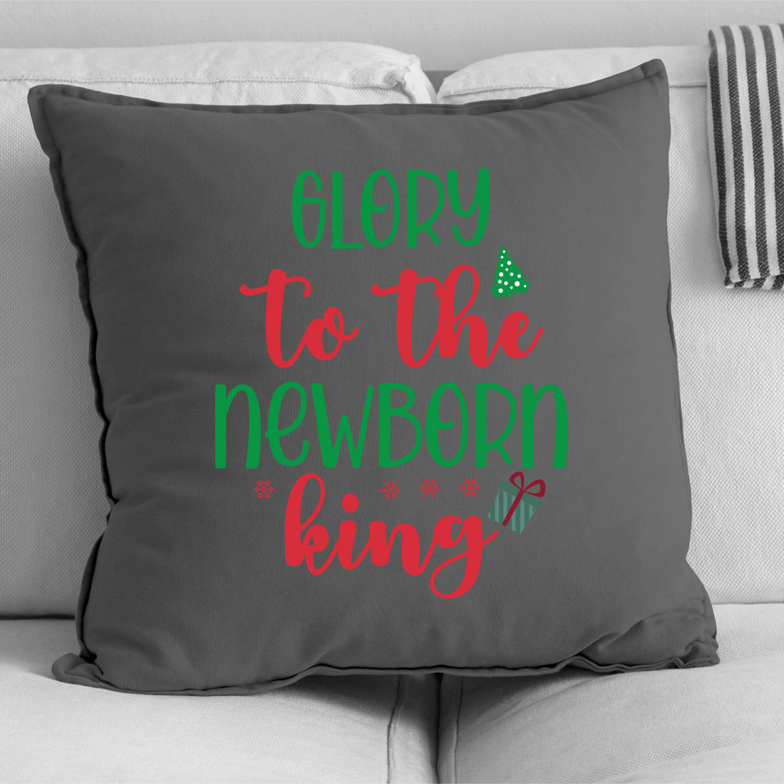 Pillow that says merry to the newborn king.