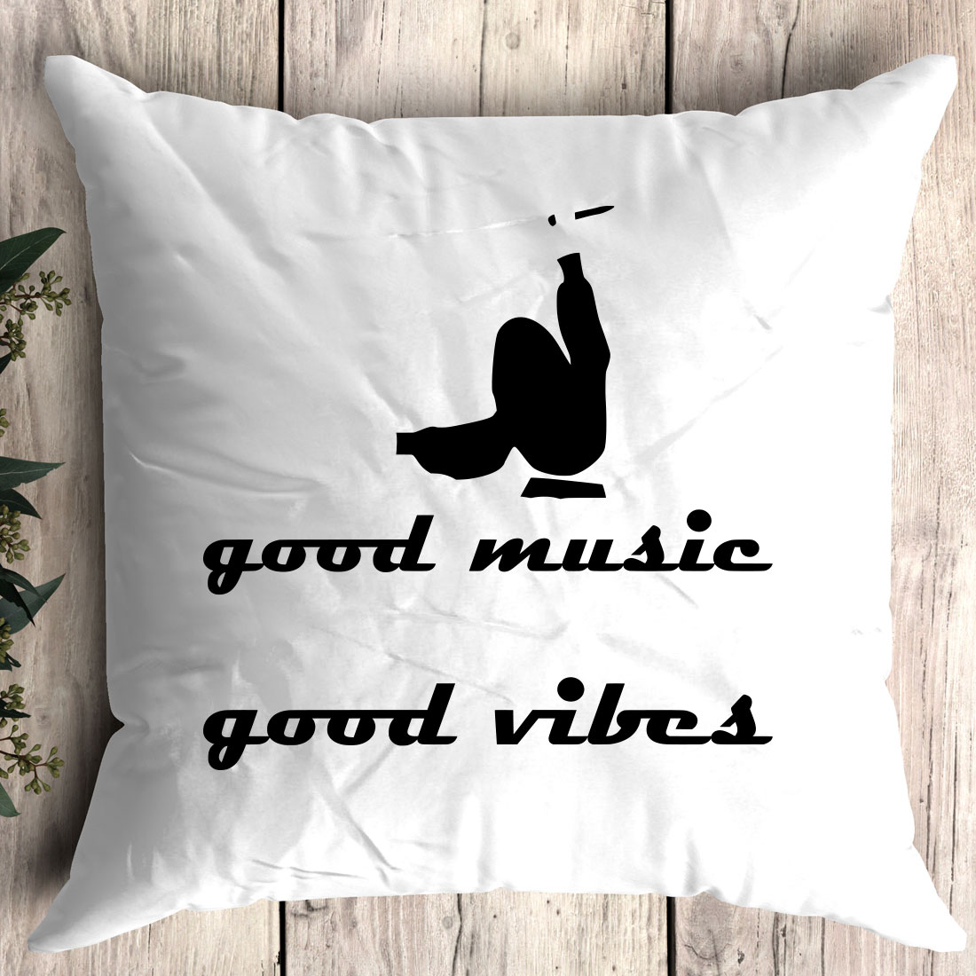 Pillow with the words good music good vibes on it.