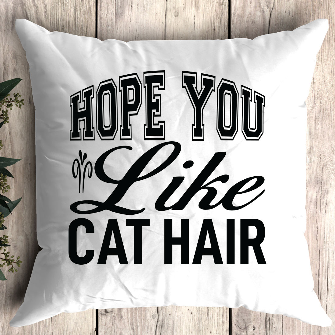 Pillow that says hope you like cat hair.