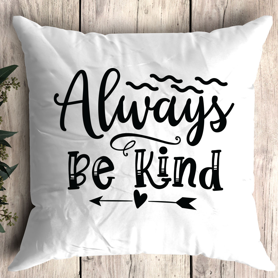 Pillow that says always be kind on it.