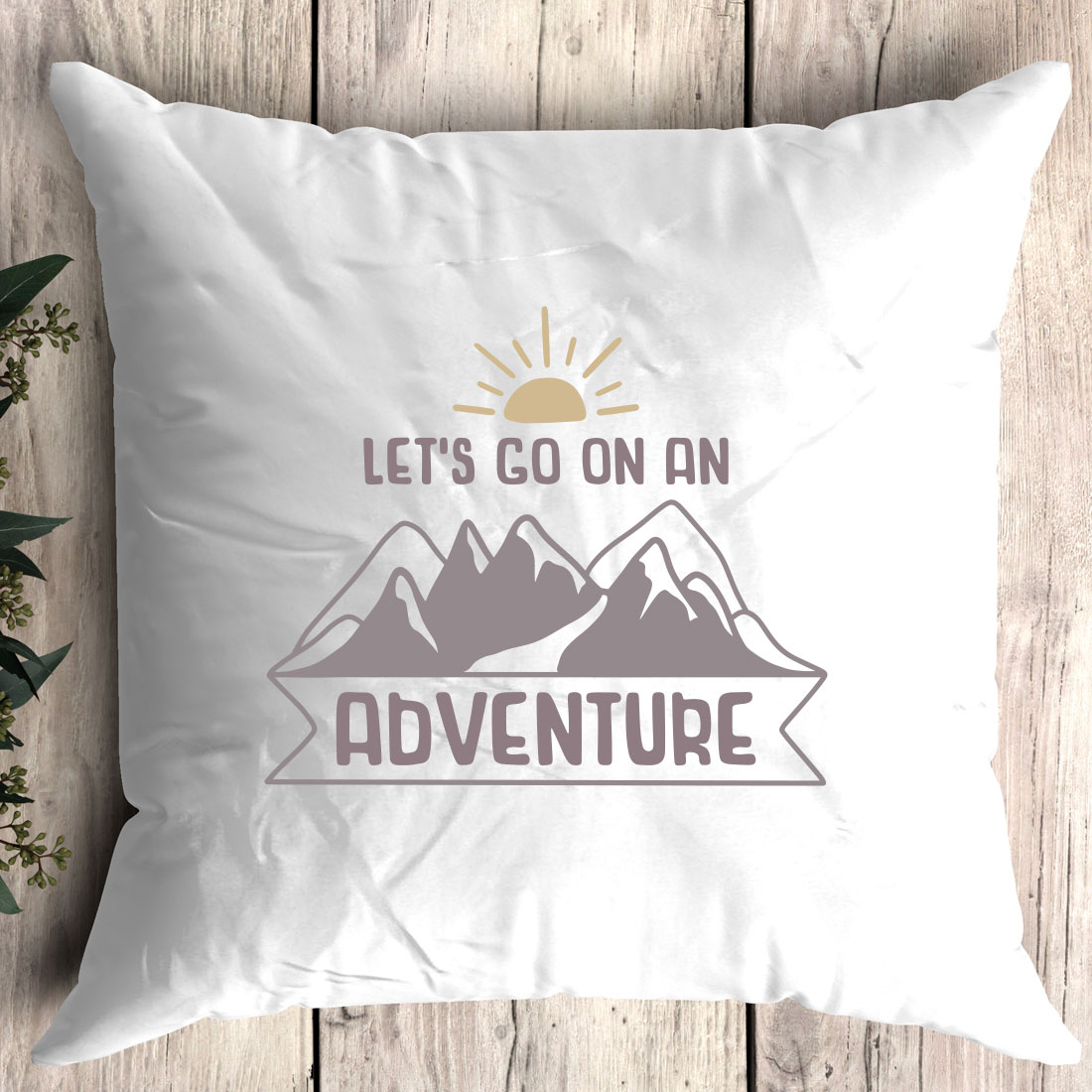 Pillow that says let's go on an adventure.