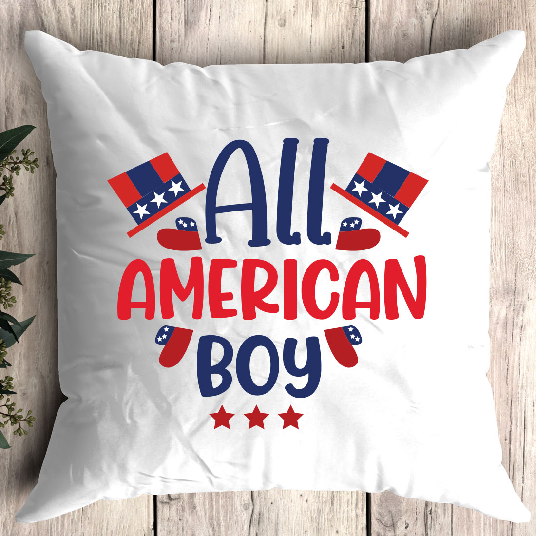 Pillow that says all american boy on it.