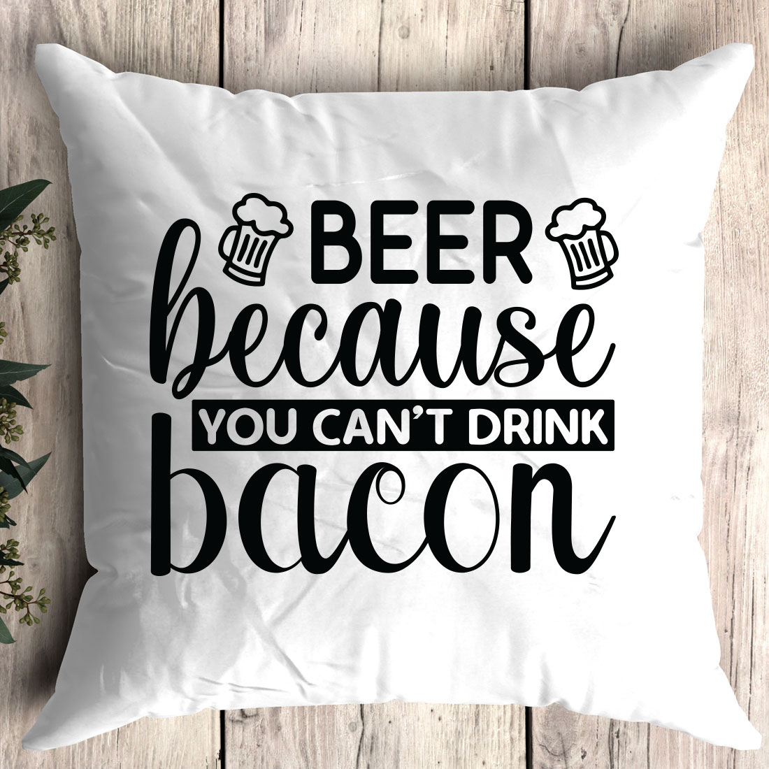 White pillow that says beer because you can't drink bacon.