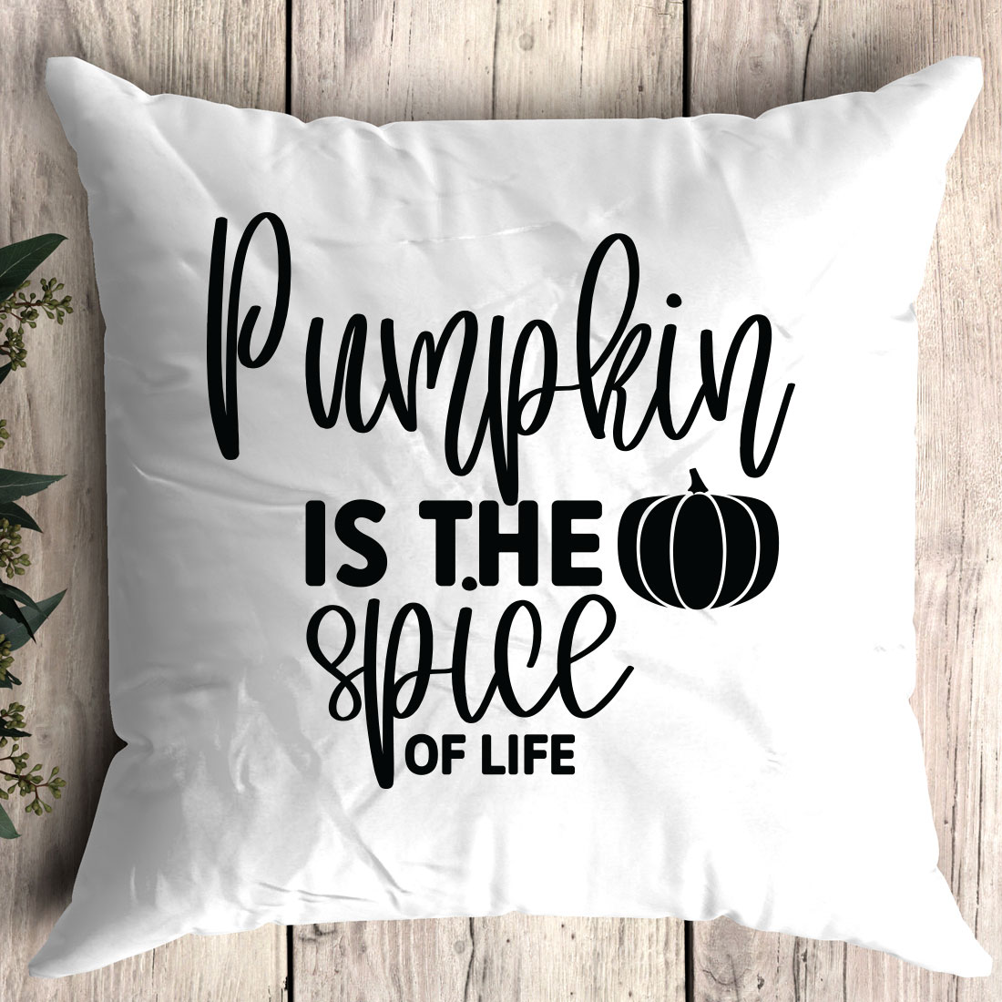 Pillow that says pumpkin is the spice of life.