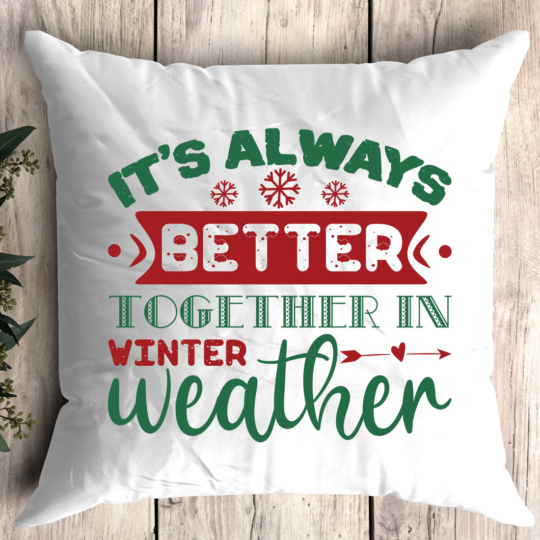 Pillow that says it's always better together in winter weather.