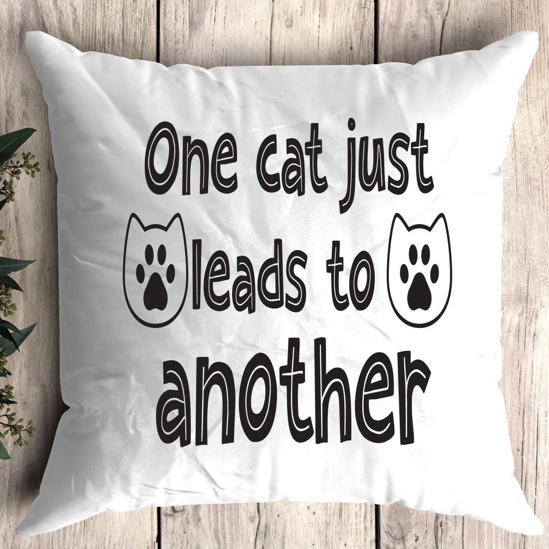 Pillow that says one cat just leads to another.