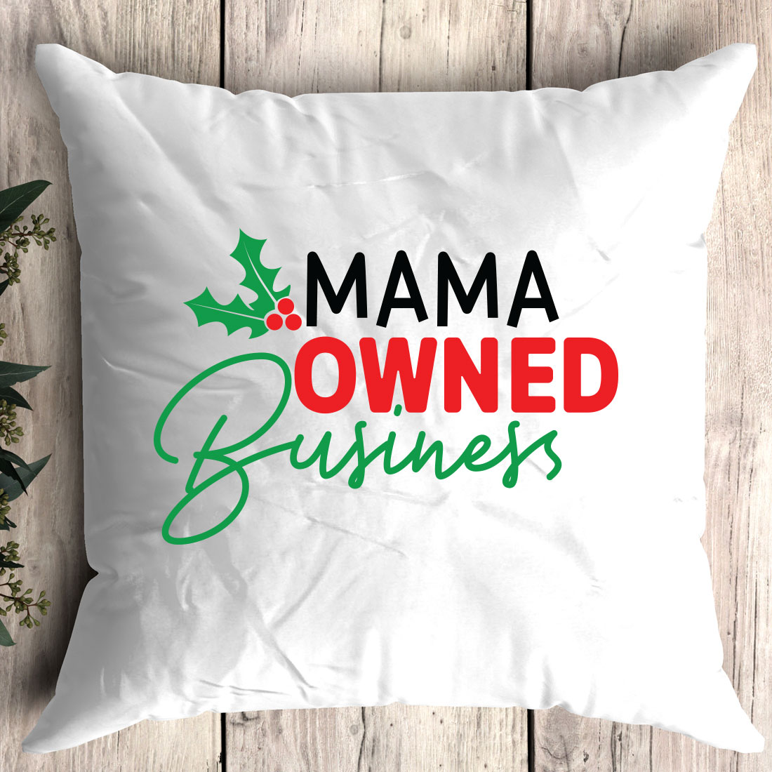 Pillow that says mama owned business on it.