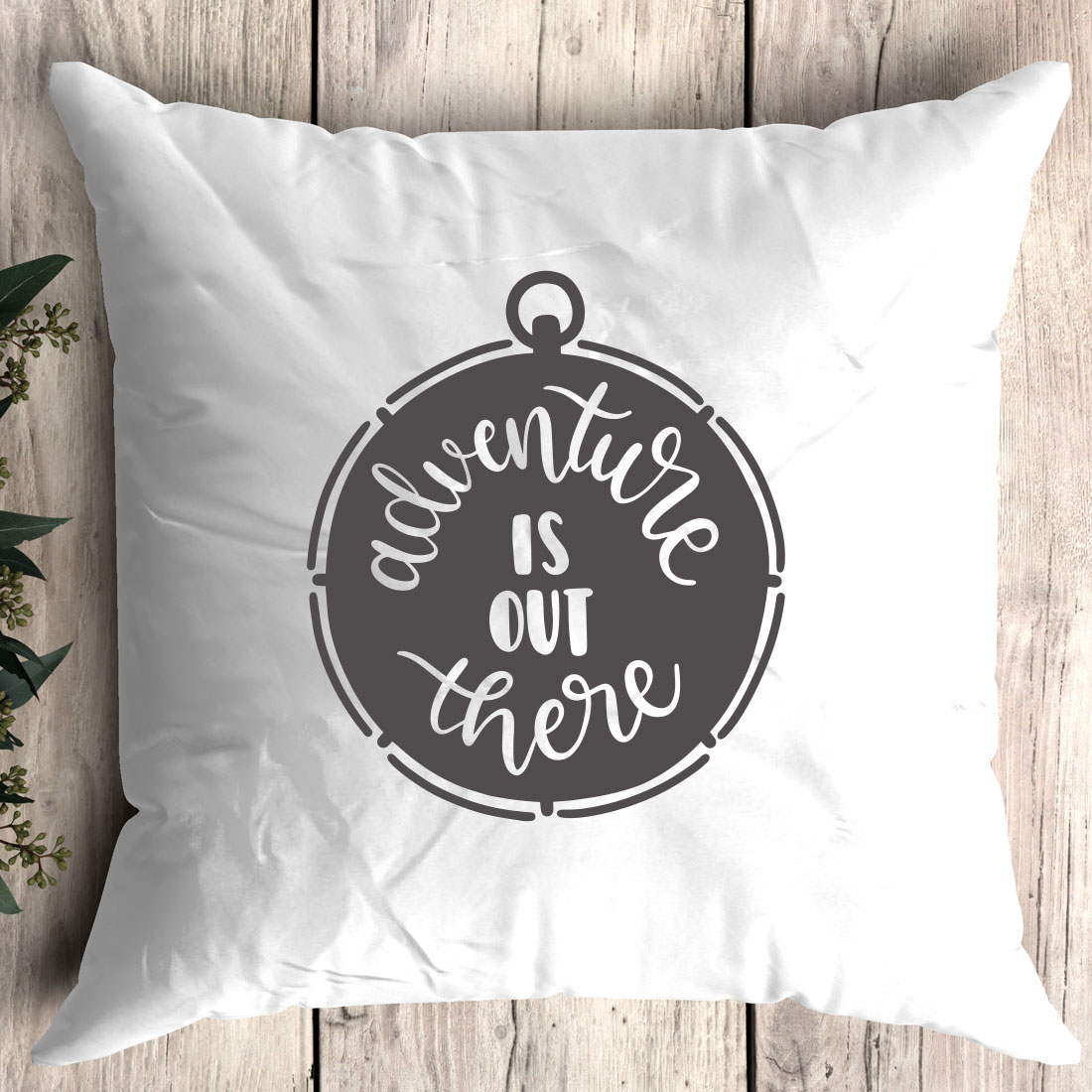 Pillow with the words adventure is out there on it.