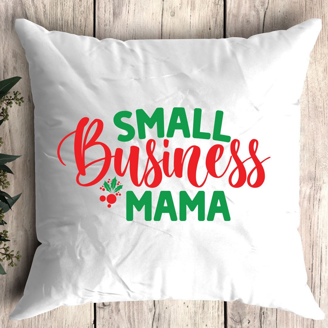 Pillow that says small business mama on it.