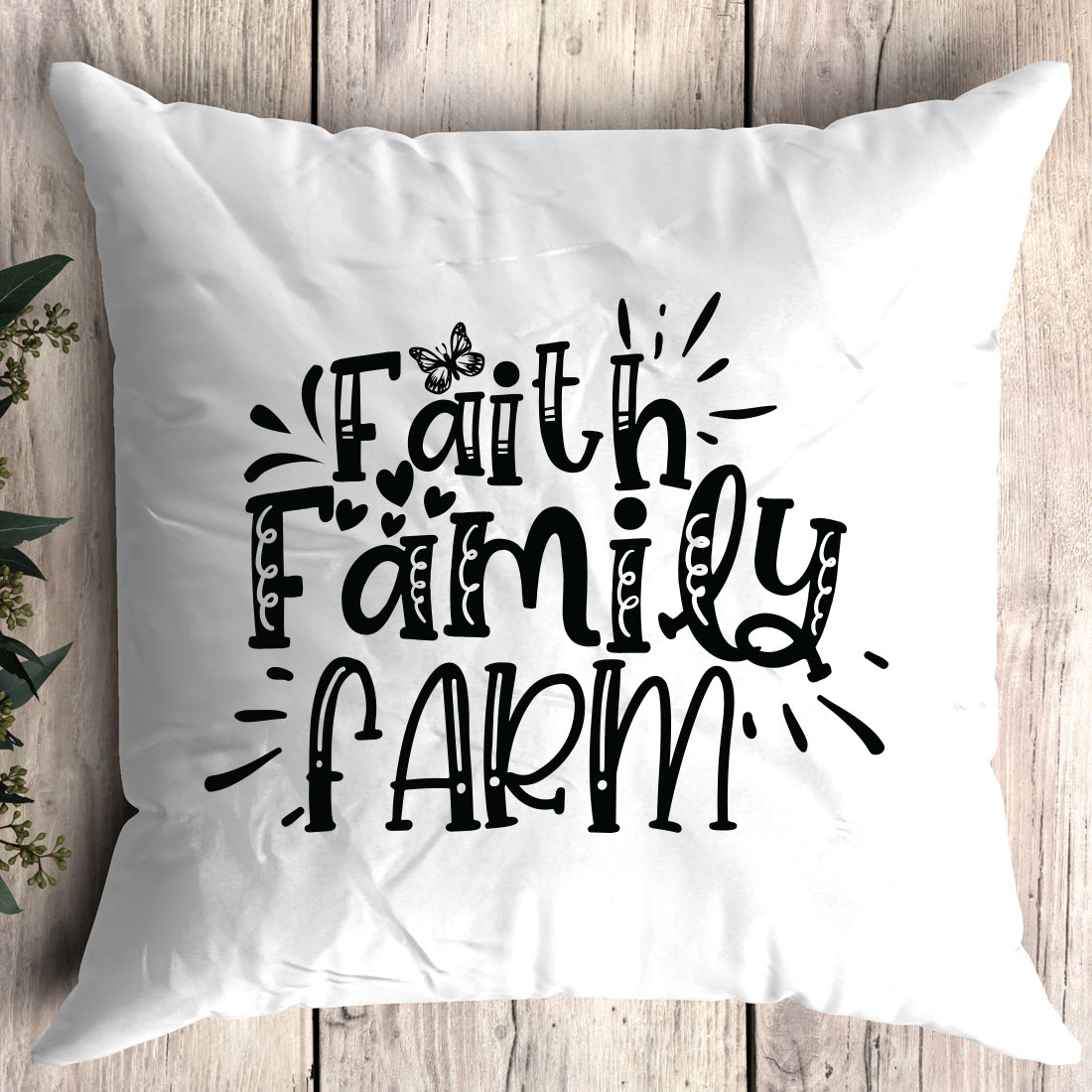 White pillow with the words faith.