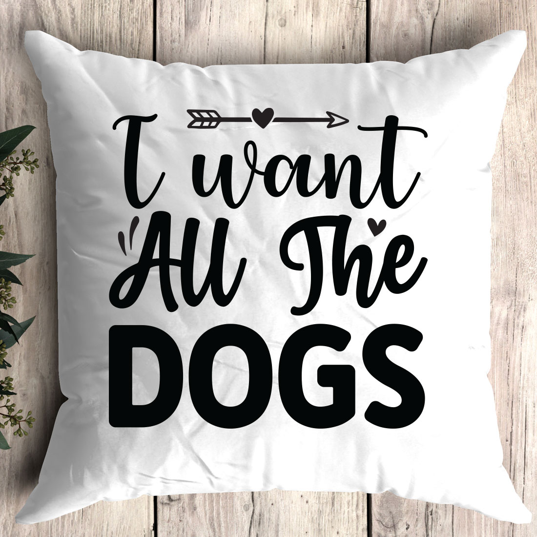 Pillow that says i want all the dogs.