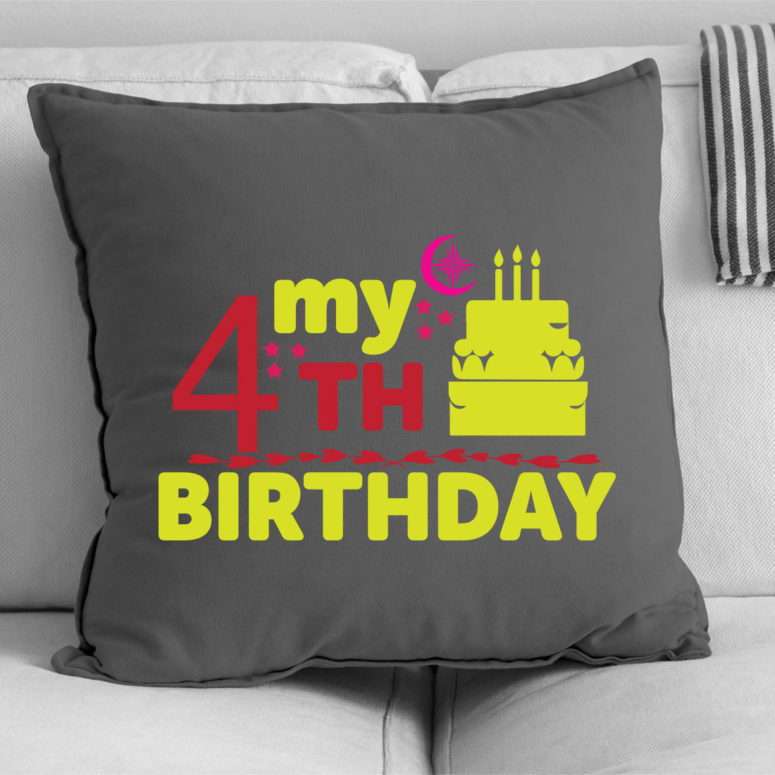 Pillow with a birthday cake on it.