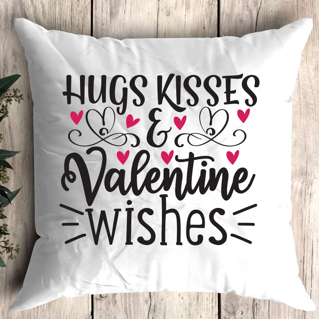 Pillow that says hugs kisses and valentine wishes.