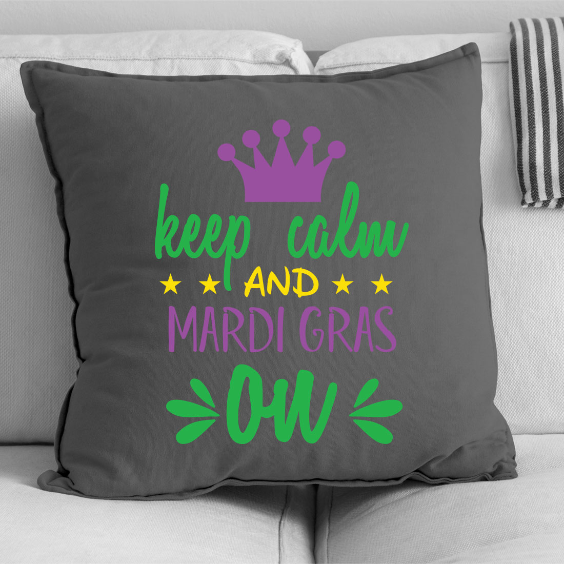 Pillow that says keep calm and mardi gras on.