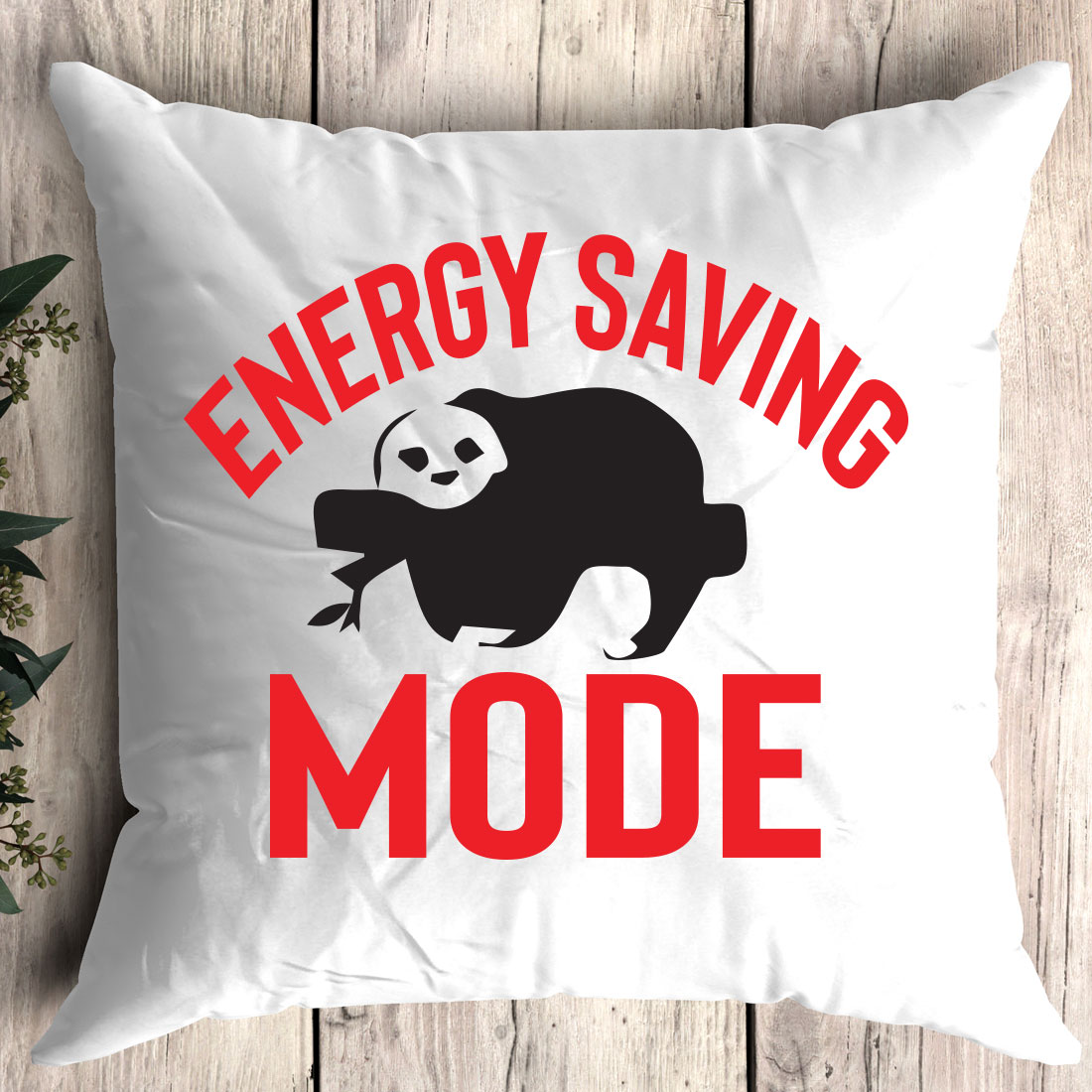 Pillow that says energy saving mode on it.