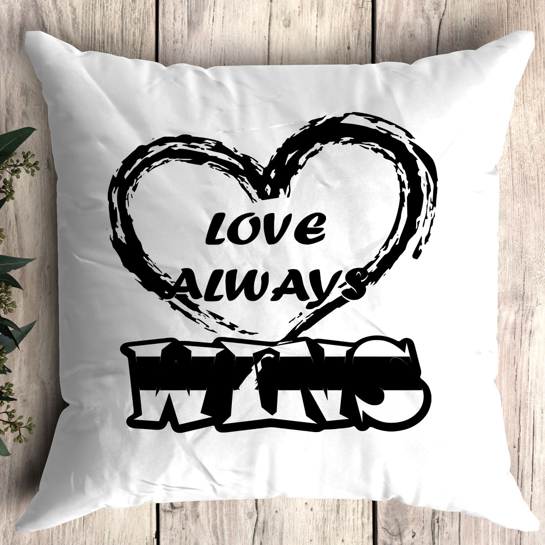 White pillow with the words love always on it.
