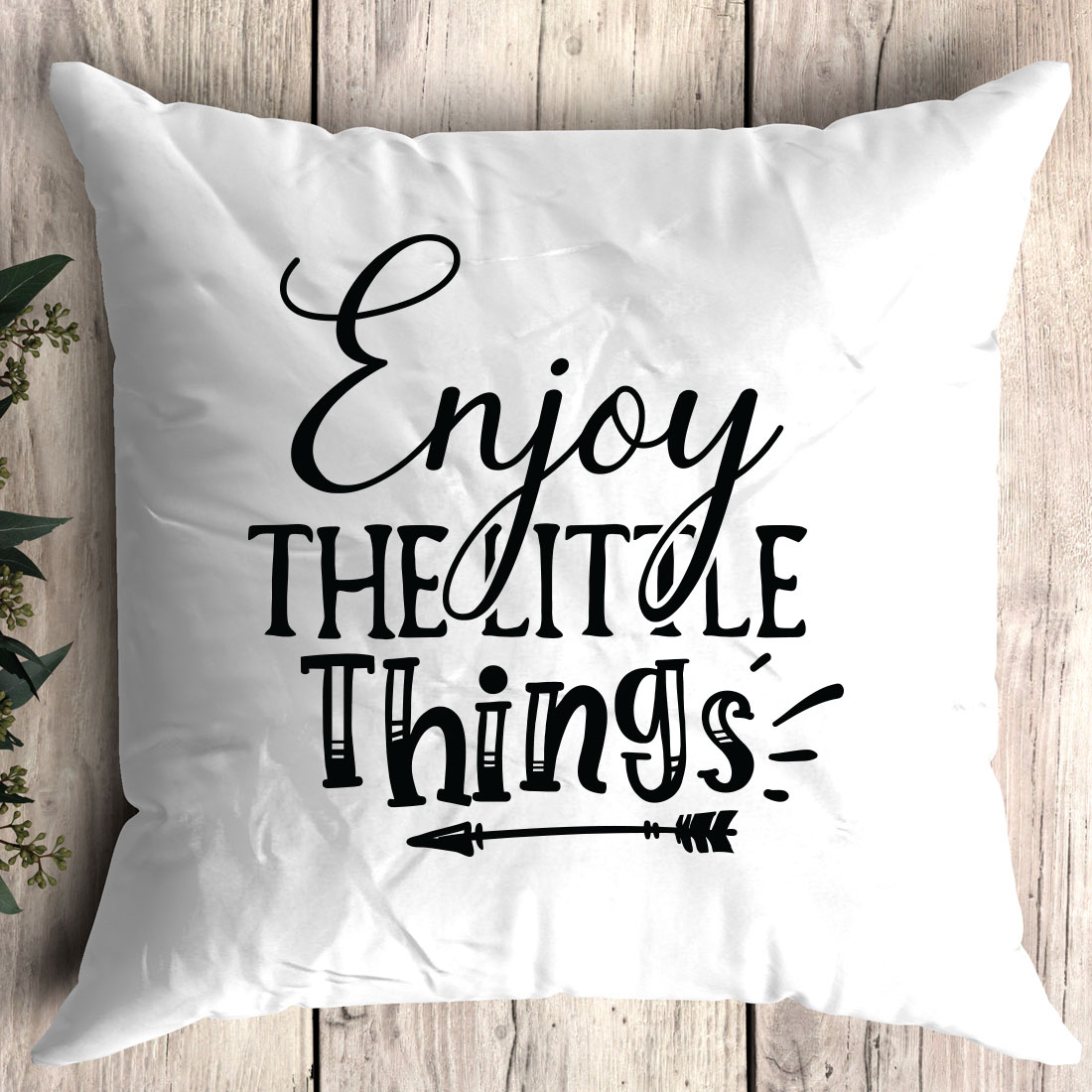 Pillow that says enjoy the little things.