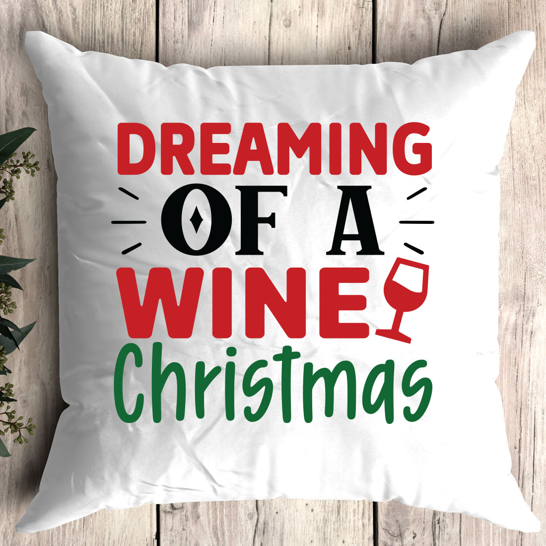 Pillow that says dreaming of a wine christmas.