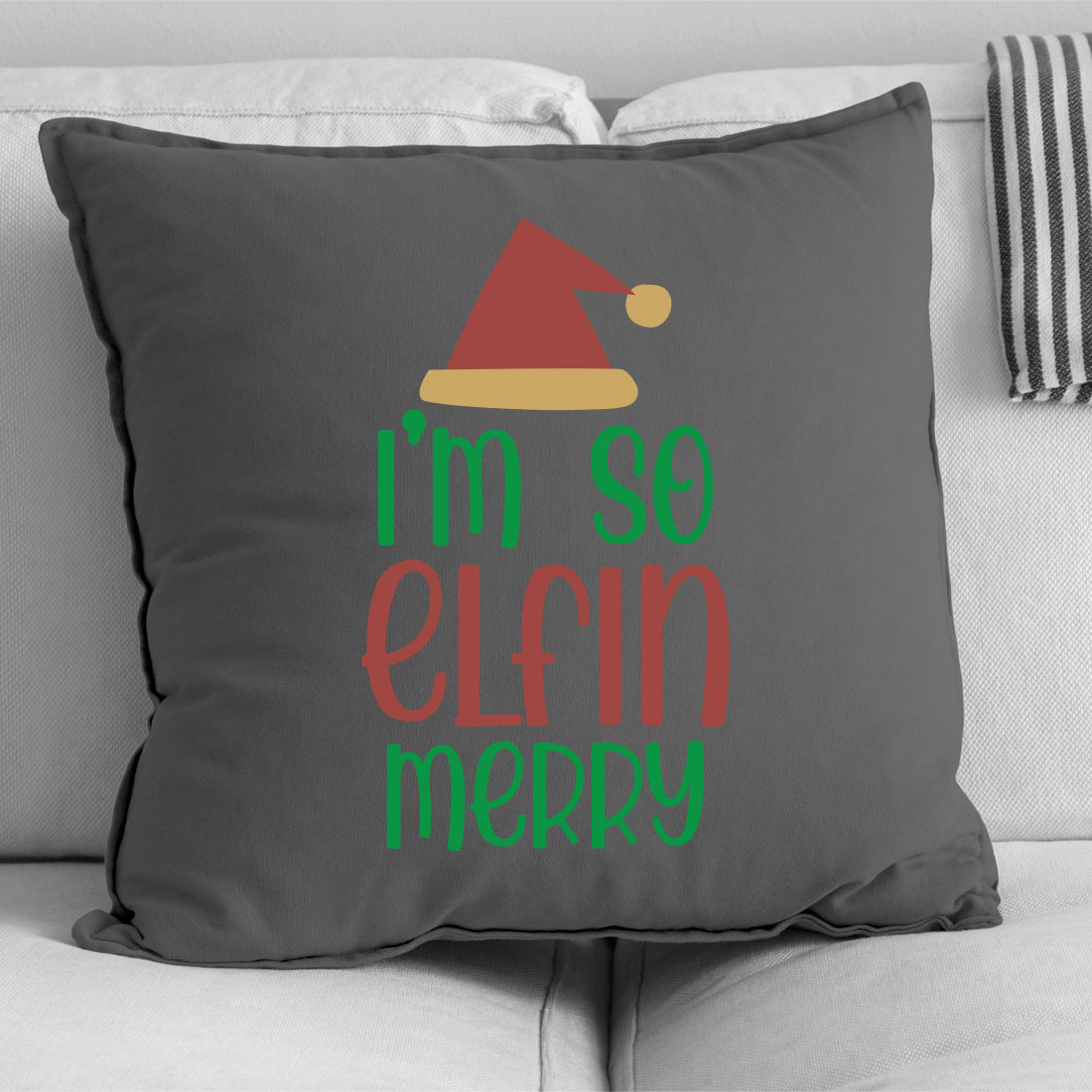 Pillow that says i'm so elf merry on it.