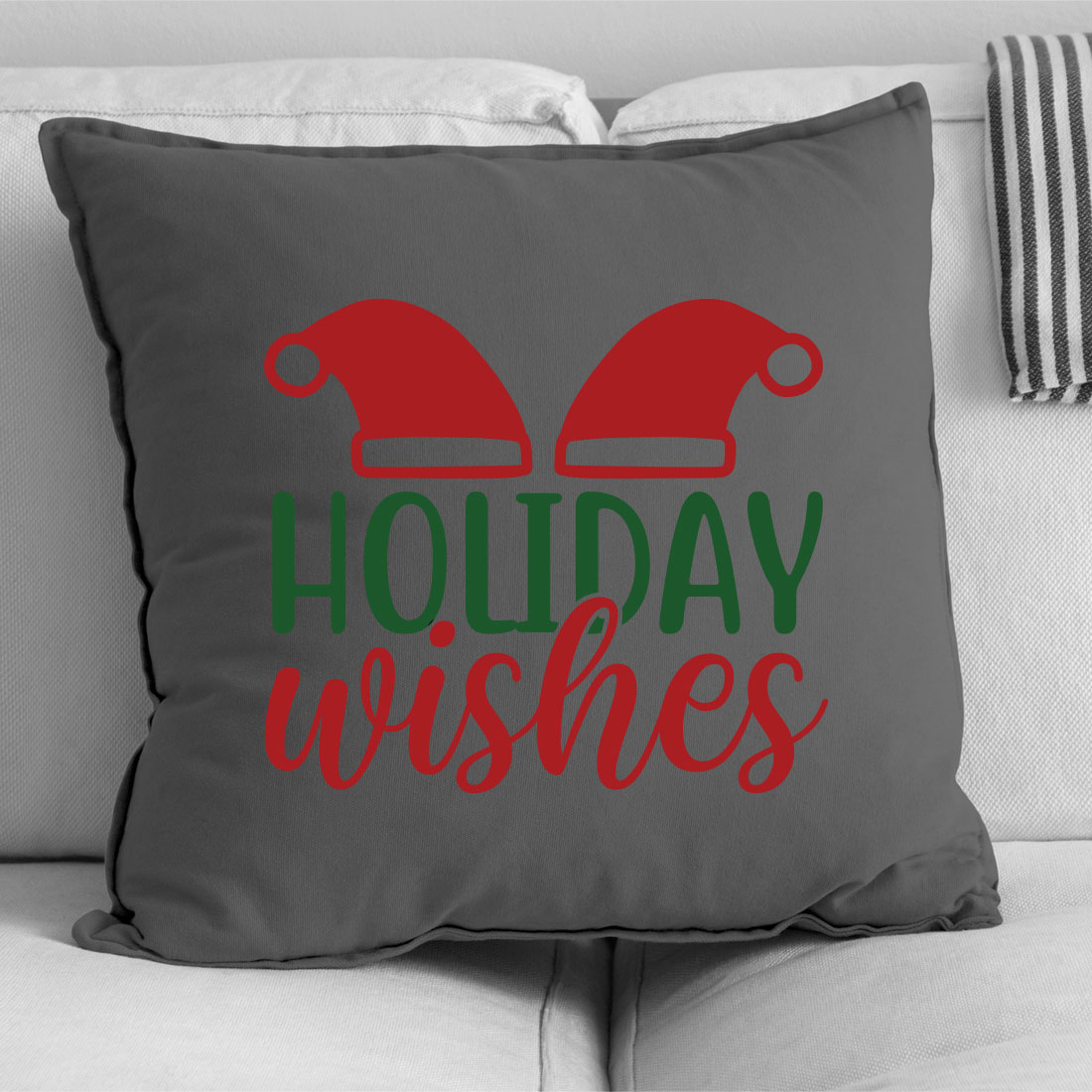 Pillow that says holiday wishes on it.