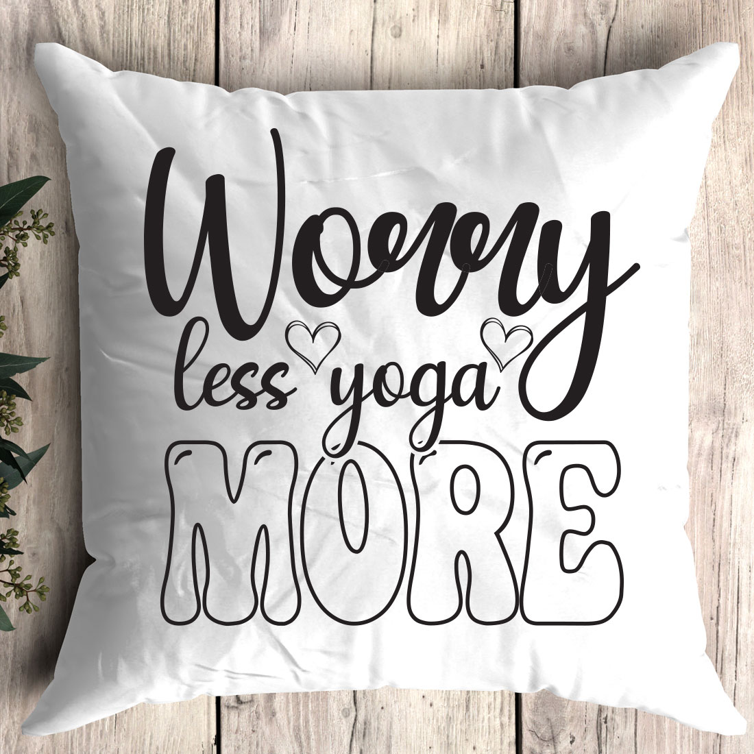Pillow that says worry less yoga more.