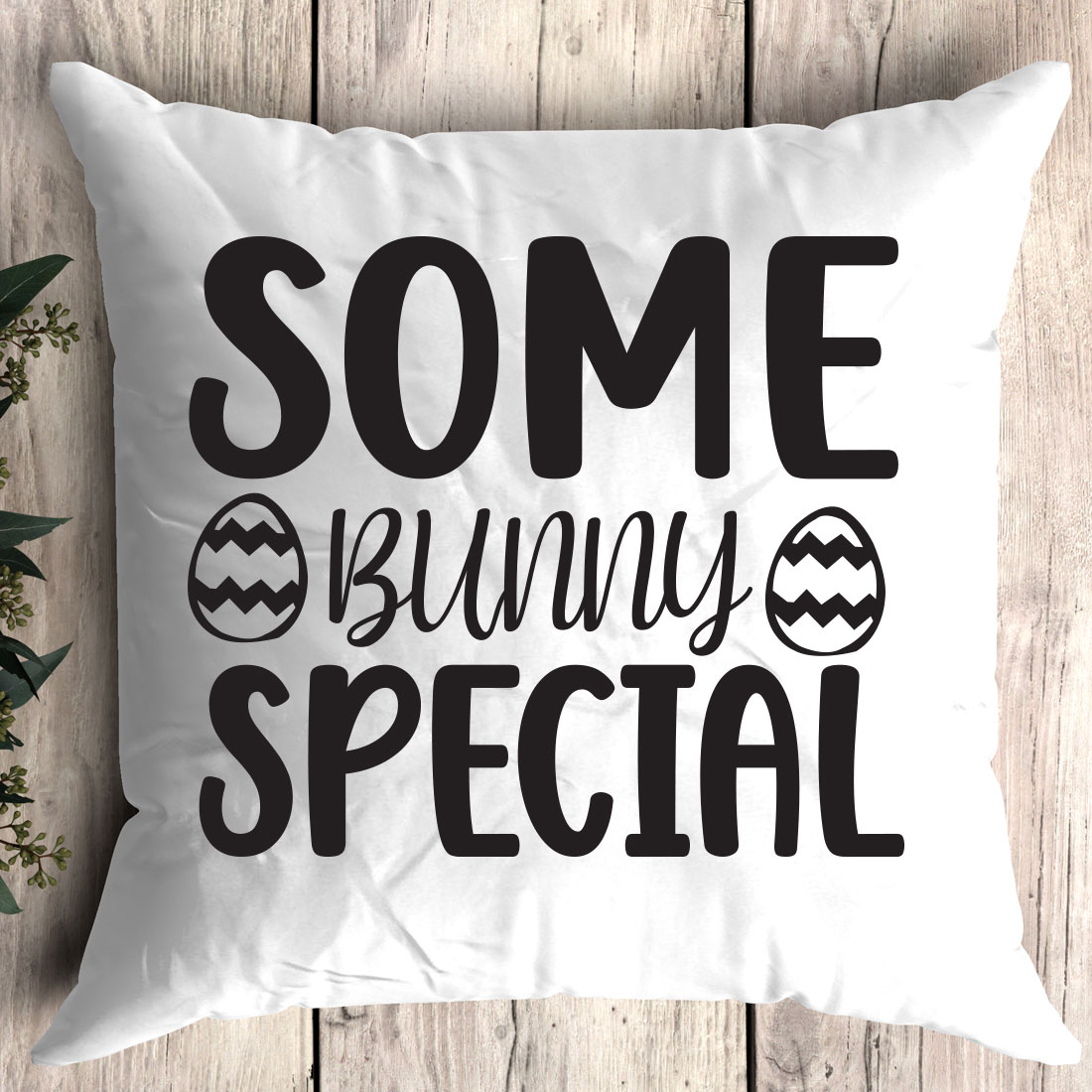 Pillow that says some bunny special on it.