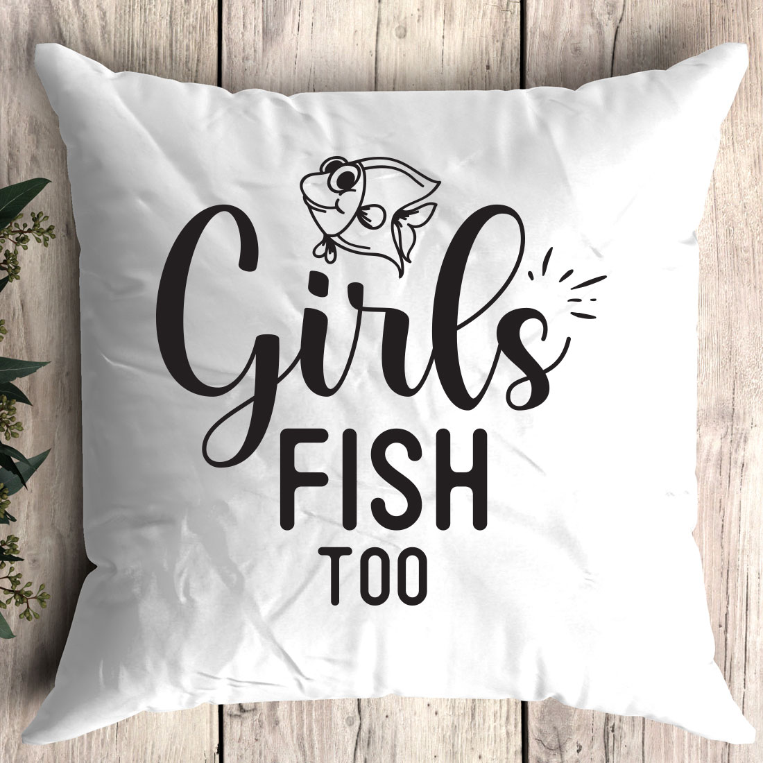 White pillow with the words girls fish too on it.