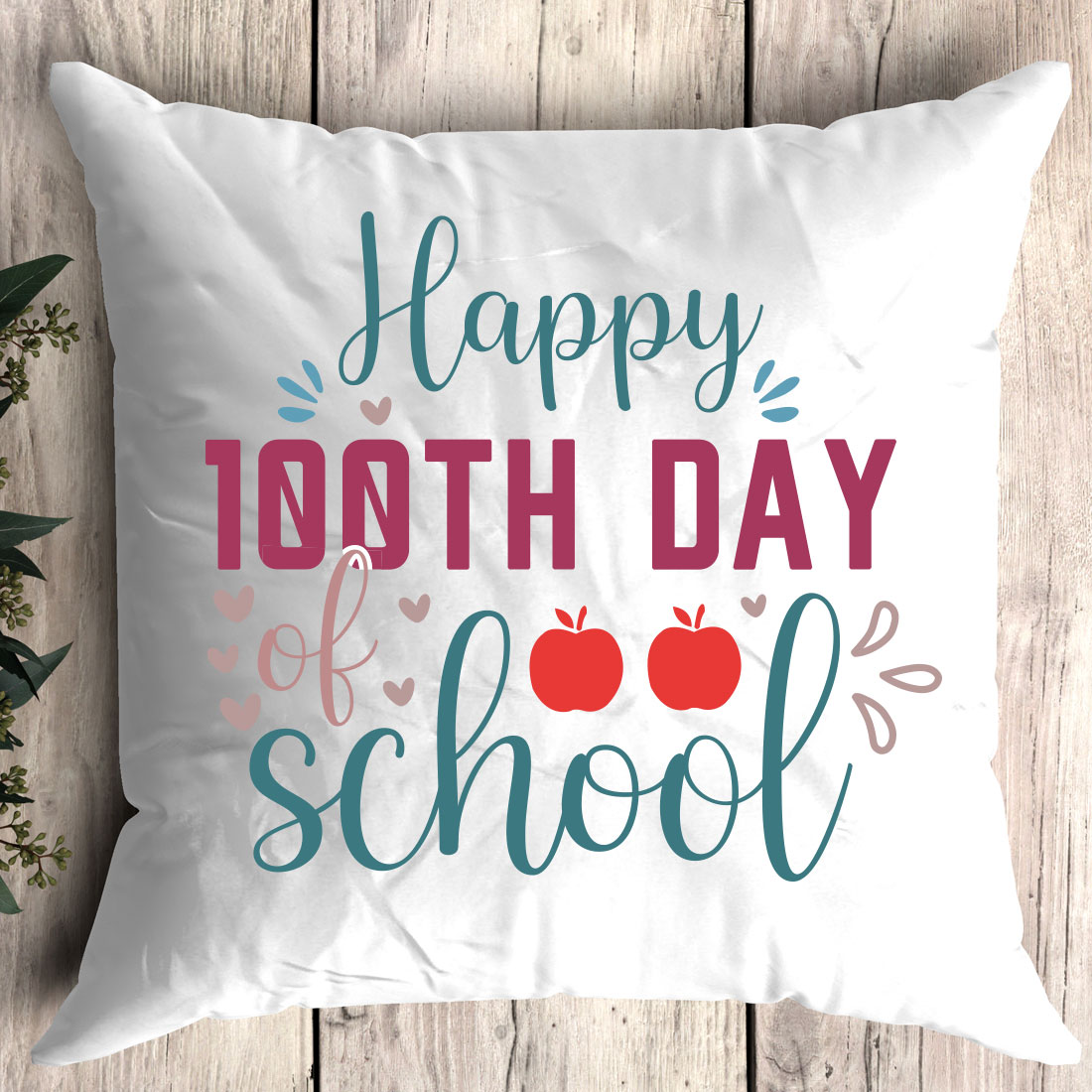 White pillow with the words happy tooth day school on it.