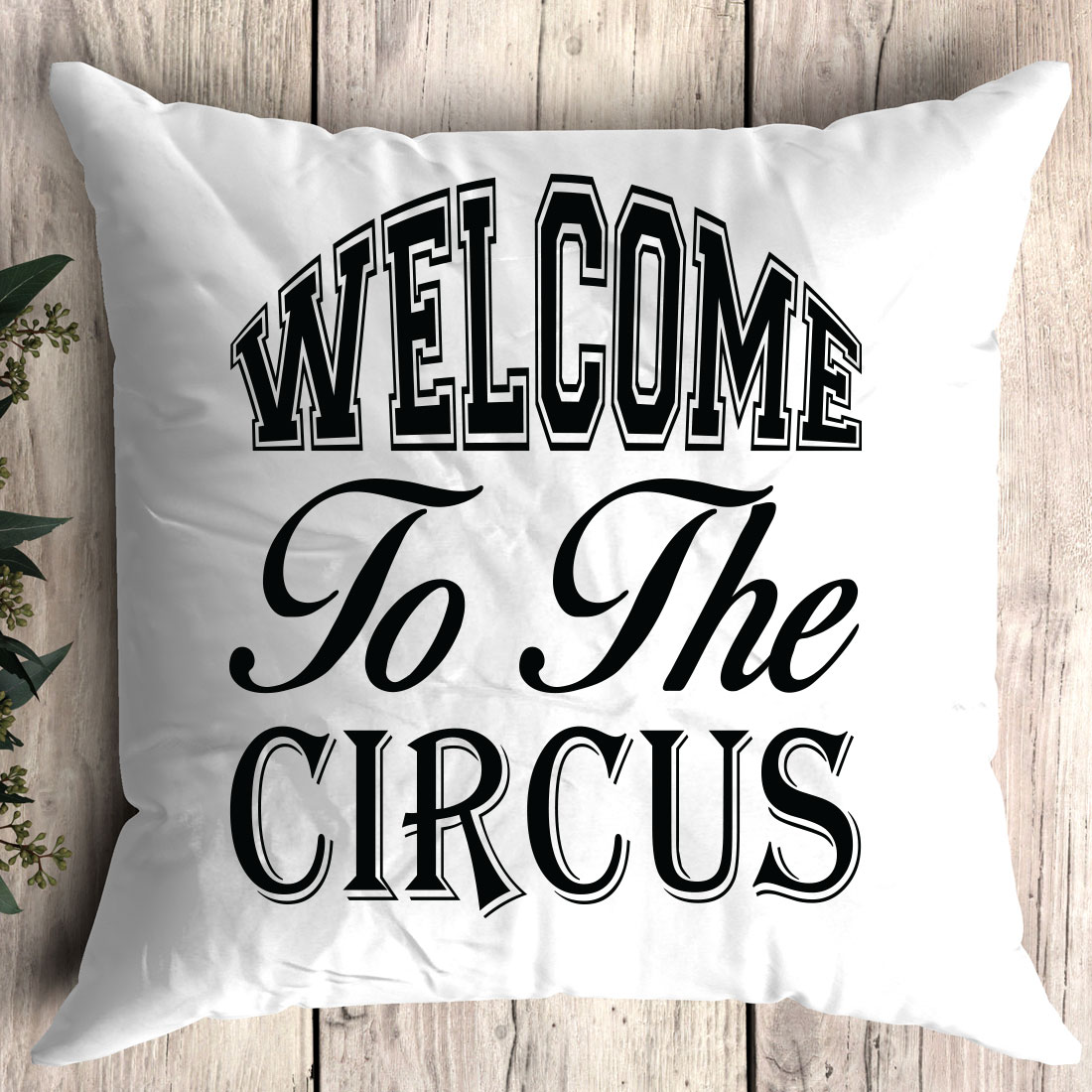 Pillow that says welcome to the circus.
