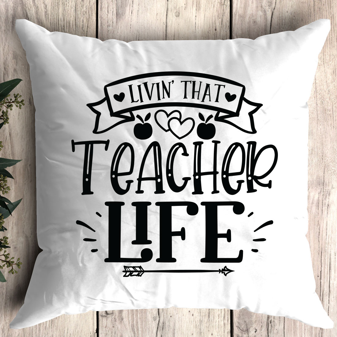 Pillow that says livin that teacher life.