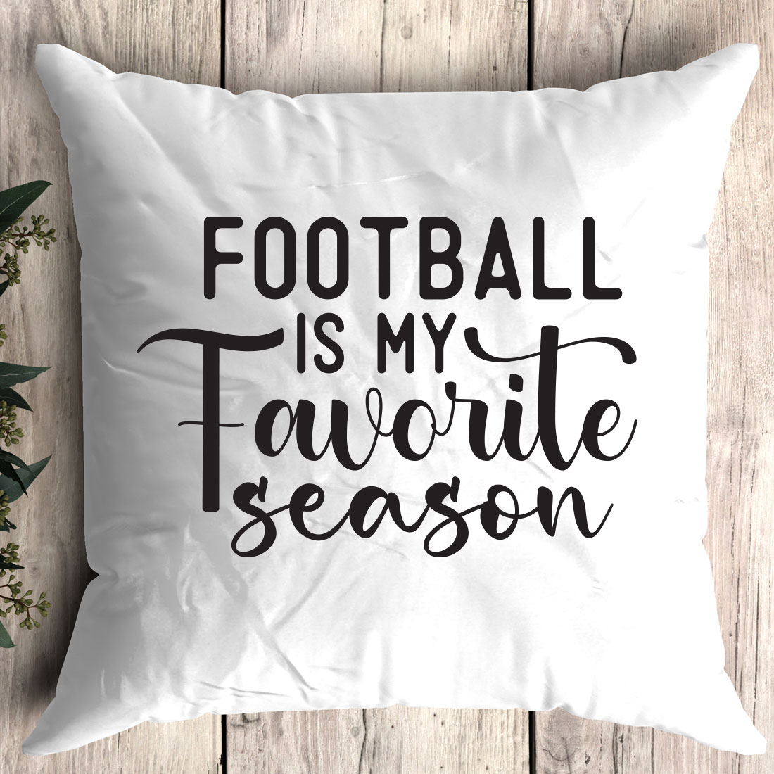 White pillow that says football is my favorite season.