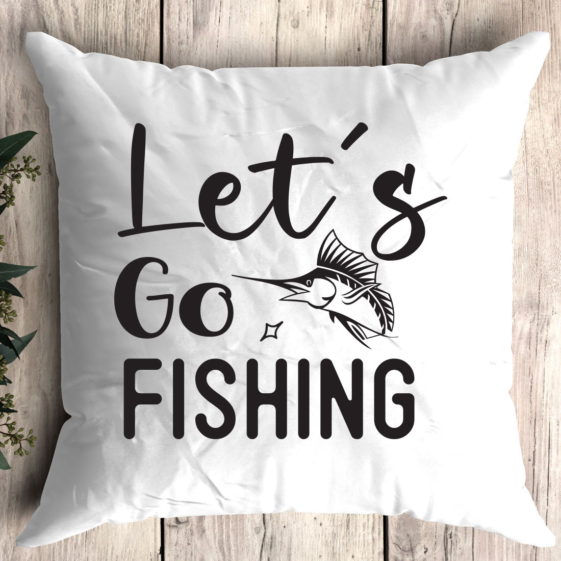 Pillow that says let's go fishing on it.