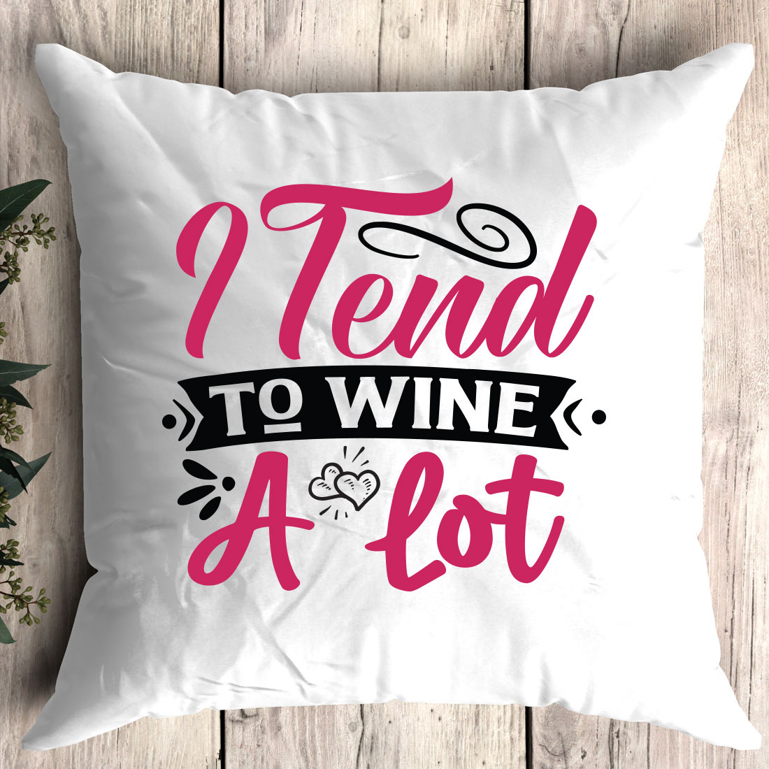White pillow with the words tend to wine a lot on it.
