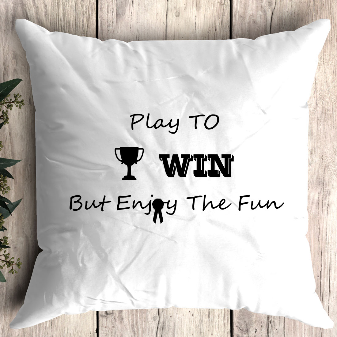 Pillow that says play to win but enjoy the fun.