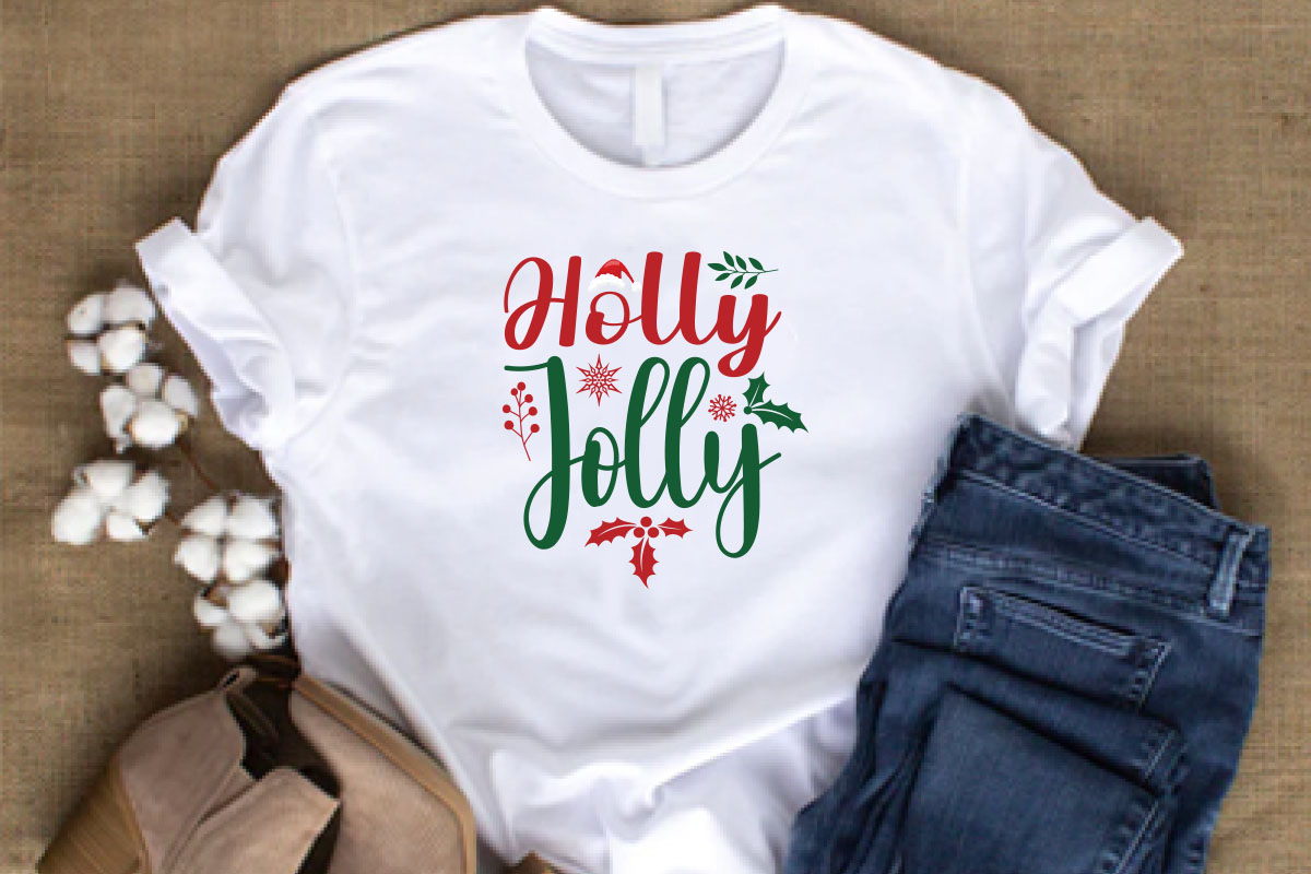 T - shirt that says holly jolly on it.