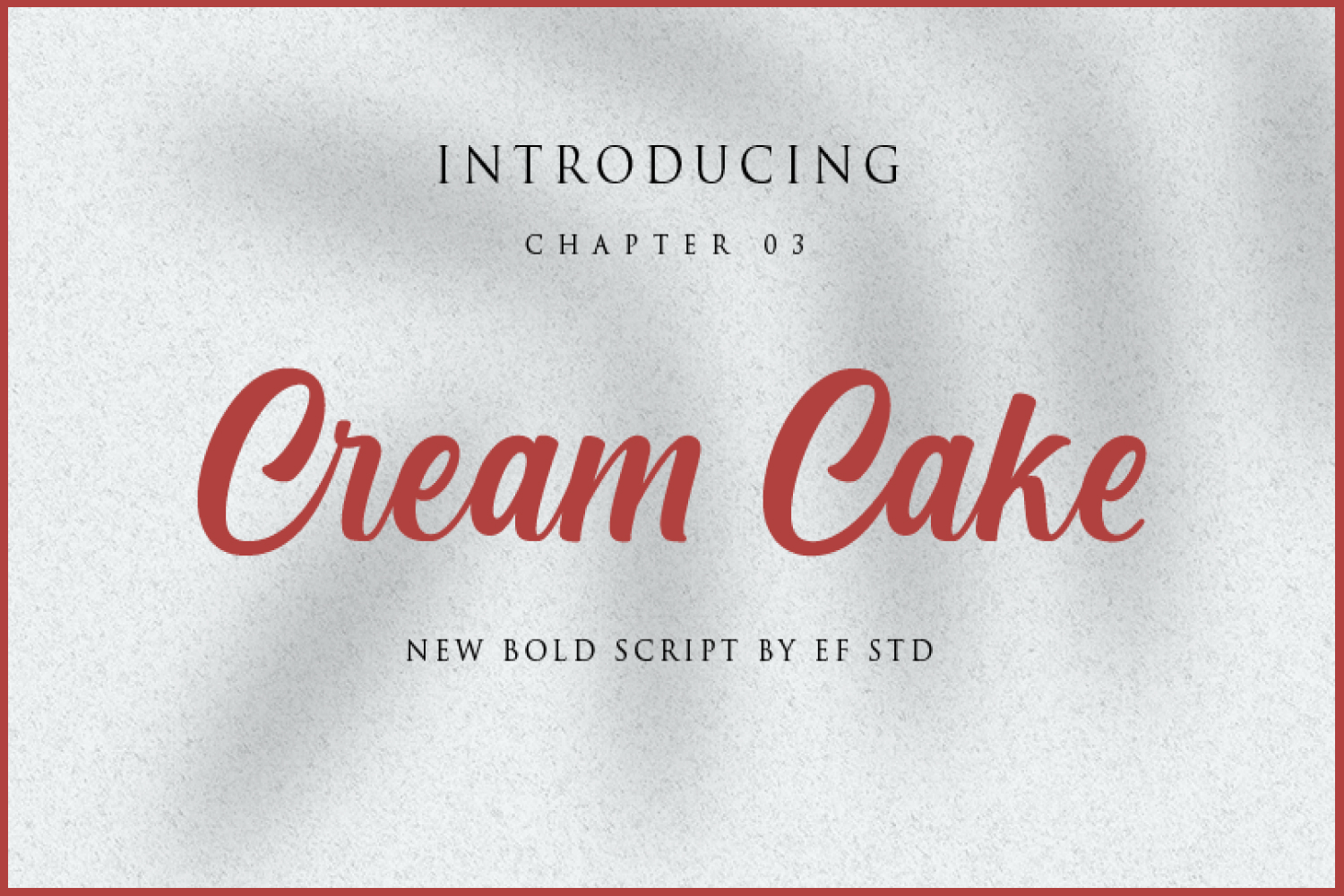 The inscription cream cake in red on a gray background.
