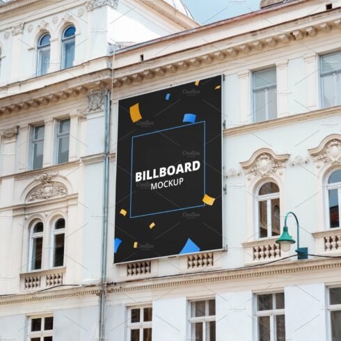 Billboard mockup on building facade cover image.