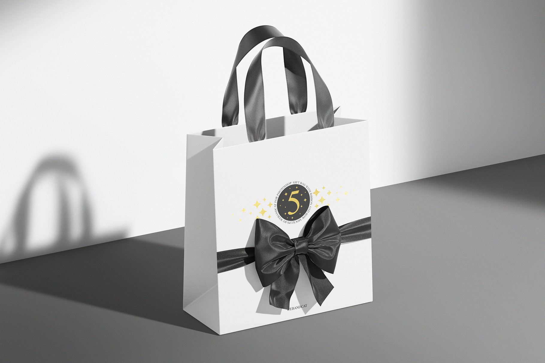 gift bag with ribbon and bow mockup 11 694