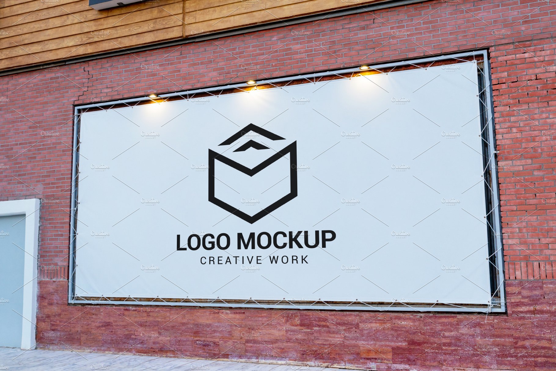 Billboard logo mockup on tarpaulin cover image.